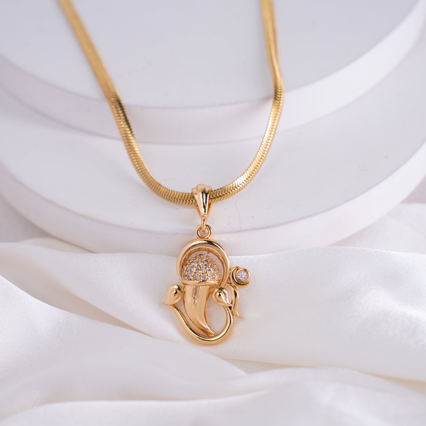 Studded CZ Ganesha Pendant with Gold Plated Chain