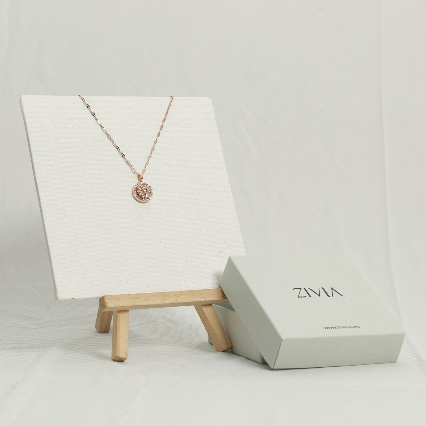 Rose Gold Spinning circle pendant